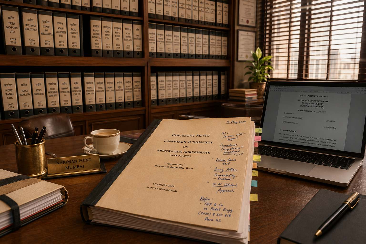 A Mumbai law-firm library — stacked matter files, an open laptop with a draft opinion, and a hand-annotated precedent memo.